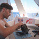 jason wynn working on sailboat engine