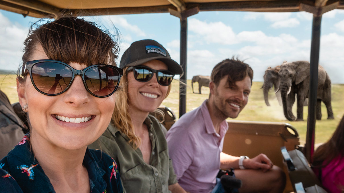 Nikki and Jason Wynn with South African friend Kate on Safari with Elephants